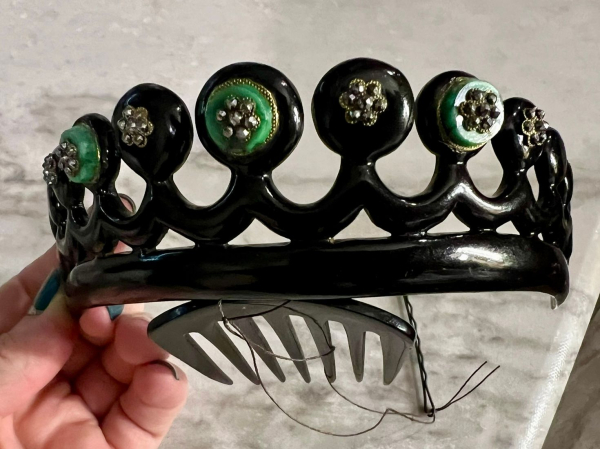 A photo of a black grown worn by Florence Pugh in Netflix's East of Eden.
